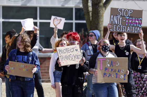 Bettendorf High School students walk out in support of Iowa's LGBTQ+ students in response to pending legislation on March 1, 2023, in Bettendorf, Iowa.