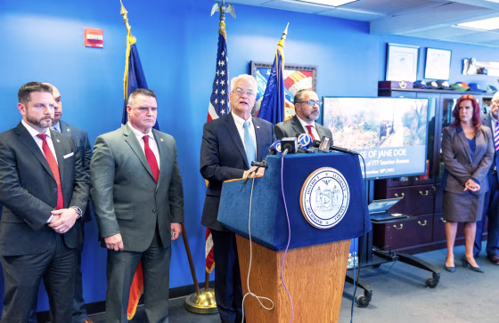 Michael E. McMahon speaks during a press conference