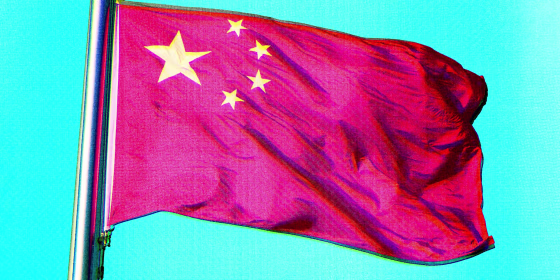 Photo Illustration: The Chinese flag with digital glitch effects applied to it