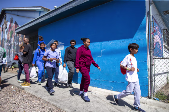 Image: A migrant family from Venezuela arrives to the shelter run by the Sacred Heart Church in El Paso, Texas, on May 12, 2023.