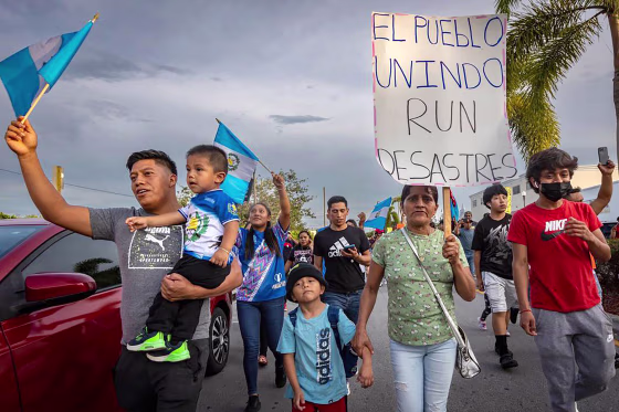Marchers carried signs and chanted slogans as they marched through the streets of Homestead, Florida on June 1, 2023, to voice their opposition to SB 1718.