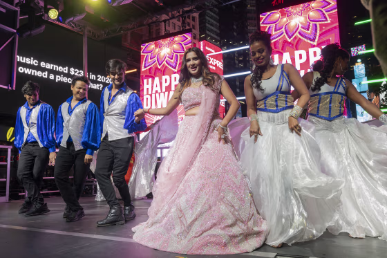 Artists perform during a Diwali celebration on a stage in Times Square