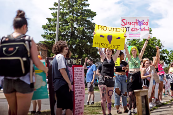 Abortion rights demonstrators protest an anti-abortion rally in Toledo, Ohio