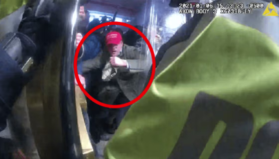 Federico Klein attempts to breach the police line and enter the Capitol building on Jan. 6, 2021.