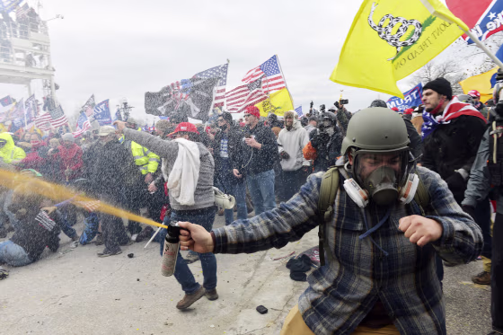 Rioters clash with police and security forces at the Capitol