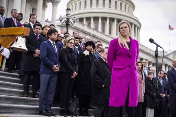 Erin Smith, the widow of D.C. Metropolitan Police Officer Jeffrey Smith, is recognized during a ceremony to mark the of the second anniversary of January 6th riot at the U.S. Capitol on Jan. 6, 2023.