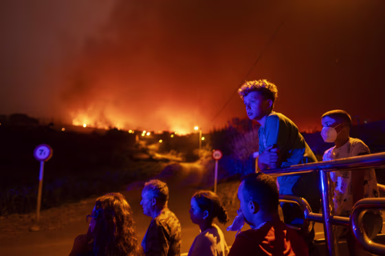 Firefighters have battled through the night to try to bring under control the worst wildfire in decades on the Spanish Canary Island of Tenerife, a major tourist destination. The fire in the north of the island started Tuesday night and has forced the evacuation or confinement of nearly 8,000 people.