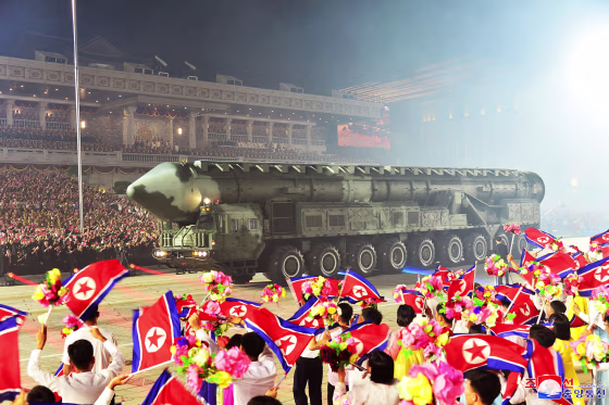 This picture taken on July 27, 2023 and released from North Korea's official Korean Central News Agency (KCNA) on July 28, 2023 shows an intercontinental ballistic missile (ICBM) being paraded at Kim Il Sung Square in Pyongyang to mark a key anniversary of the Korean War. (Photo by KCNA VIA KNS / AFP) / South Korea OUT / ---EDITORS NOTE--- RESTRICTED TO EDITORIAL USE - MANDATORY CREDIT "AFP PHOTO/KCNA VIA KNS" - NO MARKETING NO ADVERTISING CAMPAIGNS - DISTRIBUTED AS A SERVICE TO CLIENTS / THIS PICTURE WAS MADE AVAILABLE BY A THIRD PARTY. AFP CAN NOT INDEPENDENTLY VERIFY THE AUTHENTICITY, LOCATION, DATE AND CONTENT OF THIS IMAGE --- / "The erroneous mention[s] appearing in the metadata of this photo by STR has been modified in AFP systems in the following manner: [correcting year to 2023] instead of [2022]. Please immediately remove the erroneous mention[s] from all your online services and delete it (them) from your servers. If you have been authorized by AFP to distribute it (them) to third parties, please ensure that the same actions are carried out by them. Failure to promptly comply with these instructions will entail liability on your part for any continued or post notification usage. Therefore we thank you very much for all your attention and prompt action. We are sorry for the inconvenience this notification may cause and remain at your disposal for any further information you may require."