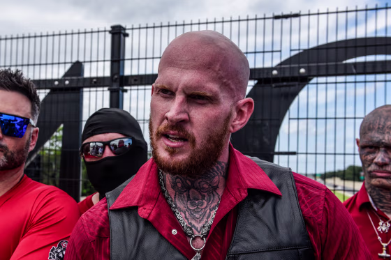 Christopher "Hammer" Pohlhaus, center, leads a rally with neo-Nazi groups Blood Tribe and Goyim Defense League on Sept. 2, 2023, in Orlando, Fla.