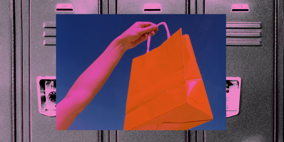 Hand holding shopping bag against photo of school lockers
