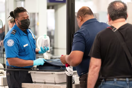 Travelers At HartsfieldJackson Atlanta International Airport As Congress Averts FAA Lapse With Stopgap Passage