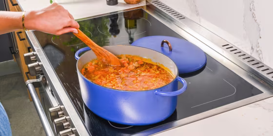 Dutch ovens have thick walls, heavy bases and tight-fitting lids, which help them evenly distribute and retain heat for long periods of time.