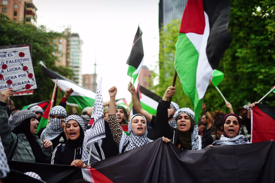 Members of the Palestinian community in Chile protest outside the Israeli Embassy against military operations in Gaza on Oct. 19, 2023, in Santiago.