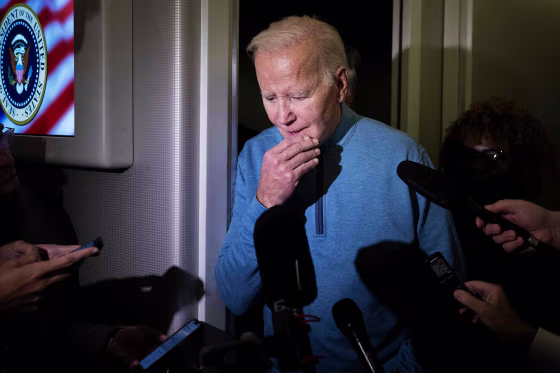 Reporters with President Joe Biden board Air Force One as he returns from a visit to Israel.
