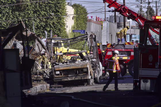 Los Angeles motorists urged to take public transport after massive fire closes interstate
