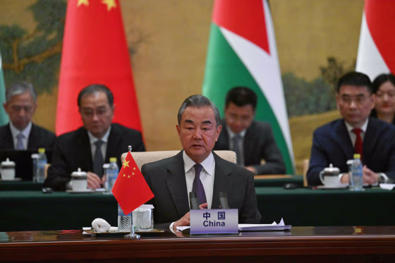 China's Foreign Minister Wang Yi attends a meeting with foreign ministers from Arab and Muslim-majority nations in Beijing on Nov. 20, 2023.