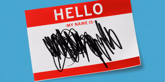Photo illustration of a "Hello, my name is" tag with scribbles.
