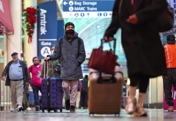 Travelers walk through Union Station on Nov. 22, 2023 in Washington, D.C.