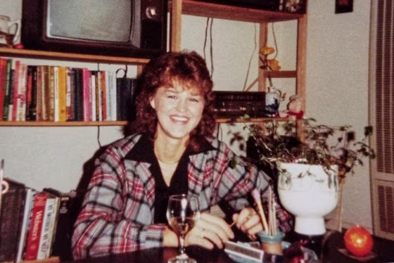 Sherri Rasmussen smiles in an archival photograph