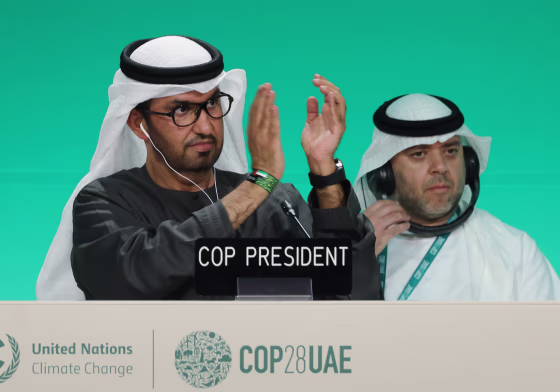Sultan Ahmed Al Jaber, left, president of the COP28 UNFCCC Climate Conference, and Majid Al-Suwaidi, director general of the COP28, attend a plenary session on Dec. 11, 2023 in Dubai.