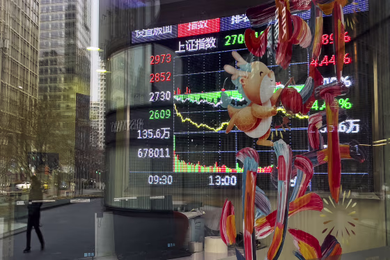 Chinese shares gyrated on Monday, sinking to 5-year lows, after stock market regulators sought to reassure jittery investors with a promise to crack down on stock price manipulation and "malicious short selling."