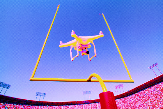 Photo Illustration: A commercial drone flying through a football goal post