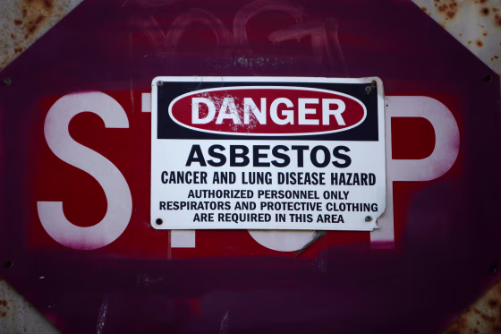 A sign warning of asbestos.