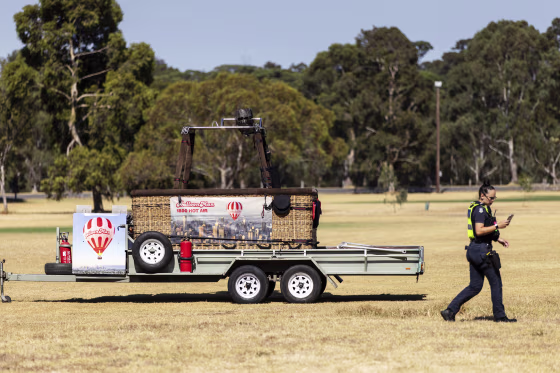 A man has fallen to his death from a hot-air balloon as it passed over suburban Melbourne, Australia's second largest city. 