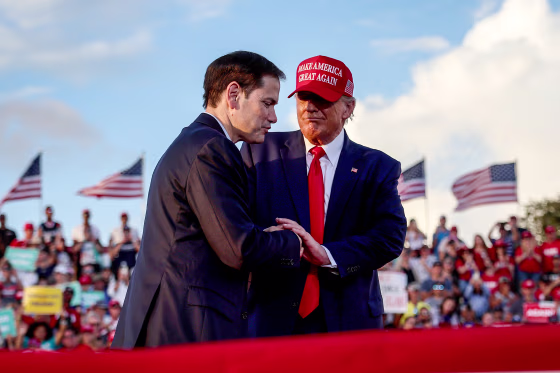 Former President Donald Trump stands with Sen. Marco Rubio, R-Fla.,