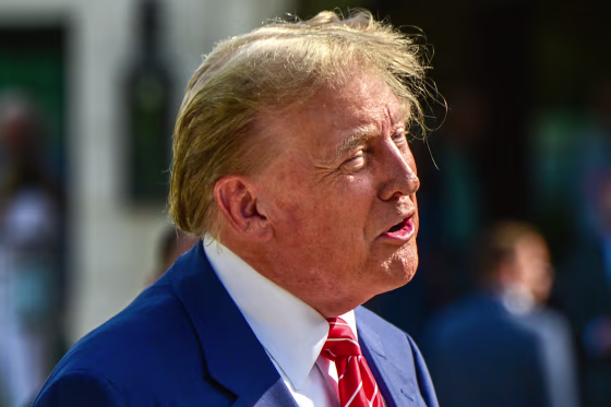 Donald Trump arrives to vote in Florida's primary election at a polling station in Palm Beach, on Tuesday.