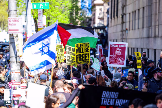 Protesters face off in front of the entrance of Columbia University.