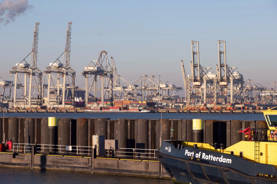 A boat with the "Port of Rotterdam" written on the side