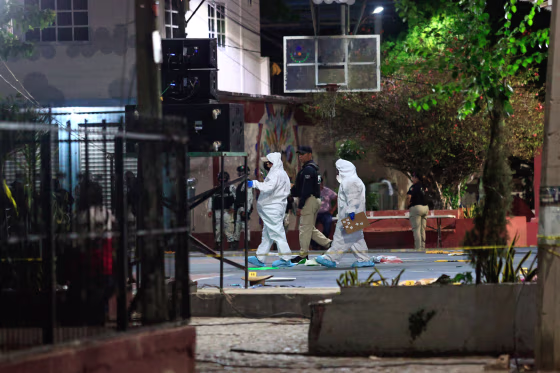 Forensic experts investigate the area where the candidate for mayor of Coyuca de Benítez, José Alfredo Cabrera Barrientos, was shot to death in Acapulco, Mexico, on May 29, 2024.