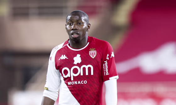 Mohamed Camara wearing jersey with a anti-homophobia badge  covered up on the field during a match between Monaco and Nantes