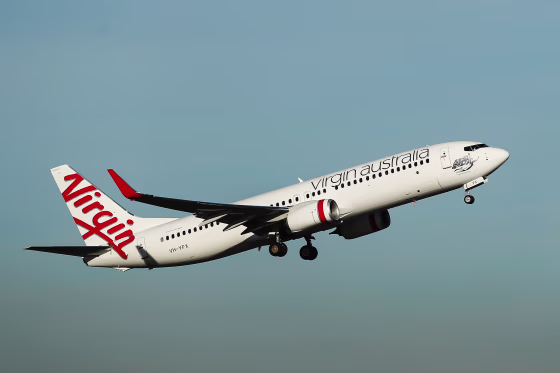 A Boeing 737 aircraft operated by Virgin Australia takes off from Sydney Airport in Sydney, Australia, on August 10, 2017.