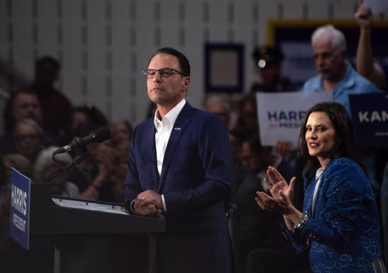 Image: Pennsylvania Governor Josh Shapiro speaks, flanked by Michigan Governor Gretchen Whitmer