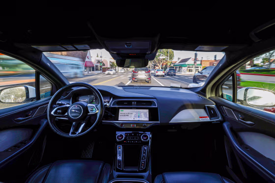 A Waymo autonomous self-driving Jaguar taxi.