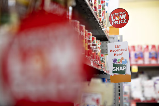 An "EBT Accepted Here" sign at a Family Dollar store.