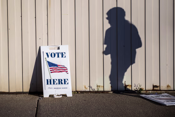 A voter walks to cast their ballot
