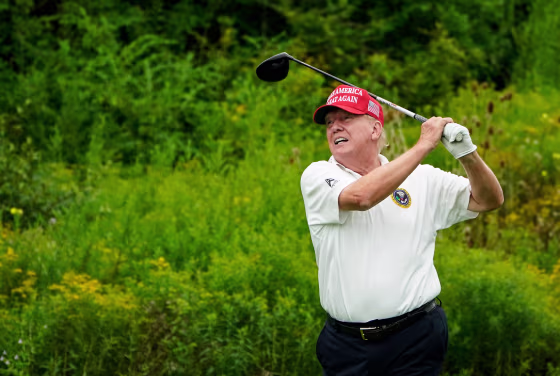 Trump golfs outside