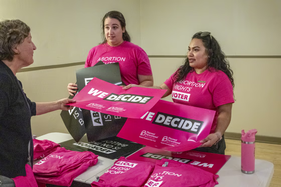 Signs supporting the Right to Abortion Initiative.
