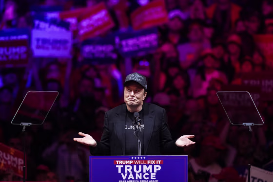 Image: Elon Musk speaks before former President Donald Trump