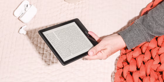 The Amazon Kindle has a great battery life and is lightweight enough to carry around.