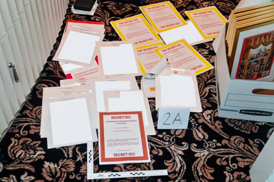 A federal judge has refused to let the Justice Department send Congress the special counsel report on the Trump classified documents case; pictured are some of the documents seized during an FBI search of Trump's Mar-a-Lago estate, partially redacted by the source.