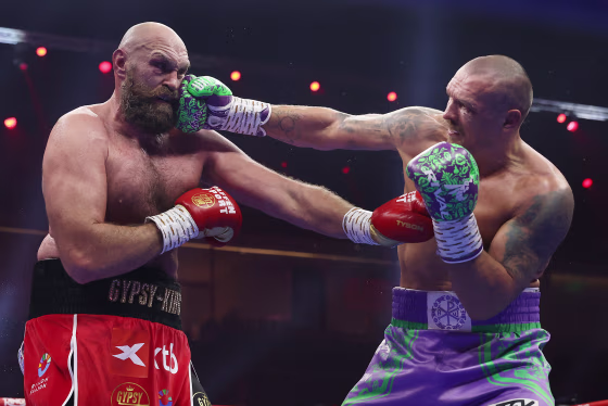 Oleksandr Usyk punches Tyson Fury