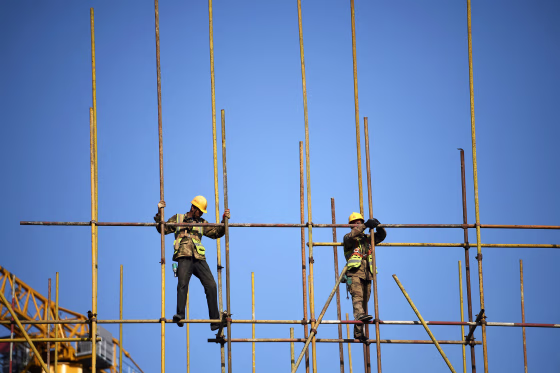 china economy workers construction scaffolding