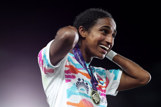 Naomi Girma smiles