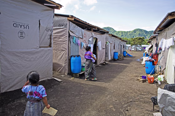 Guatemalan mother and children living in refugee camp.