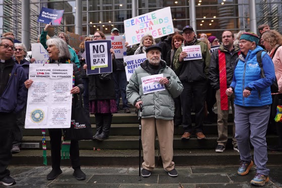 Protesters gather outside federal court in Seattle on Tuesday.