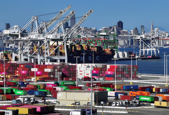 An aerial view of shipping containers stacked at the Port of Oakland
